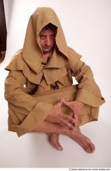 Joel Adamson Monk Sitting Pose